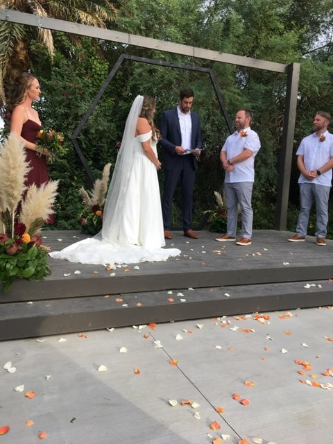 Wedding ceremony on stage with plant background