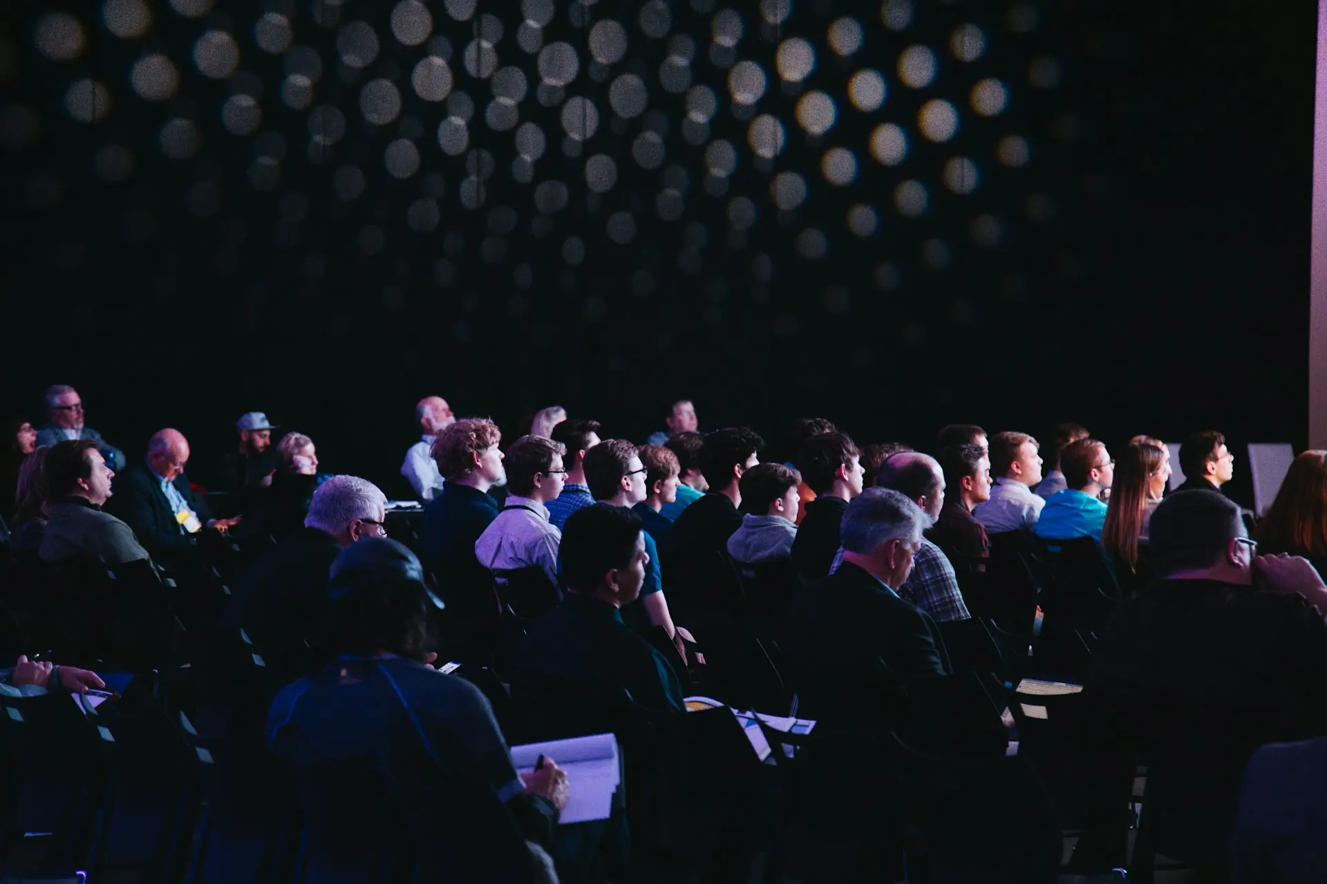 Audience seated at a large conference session