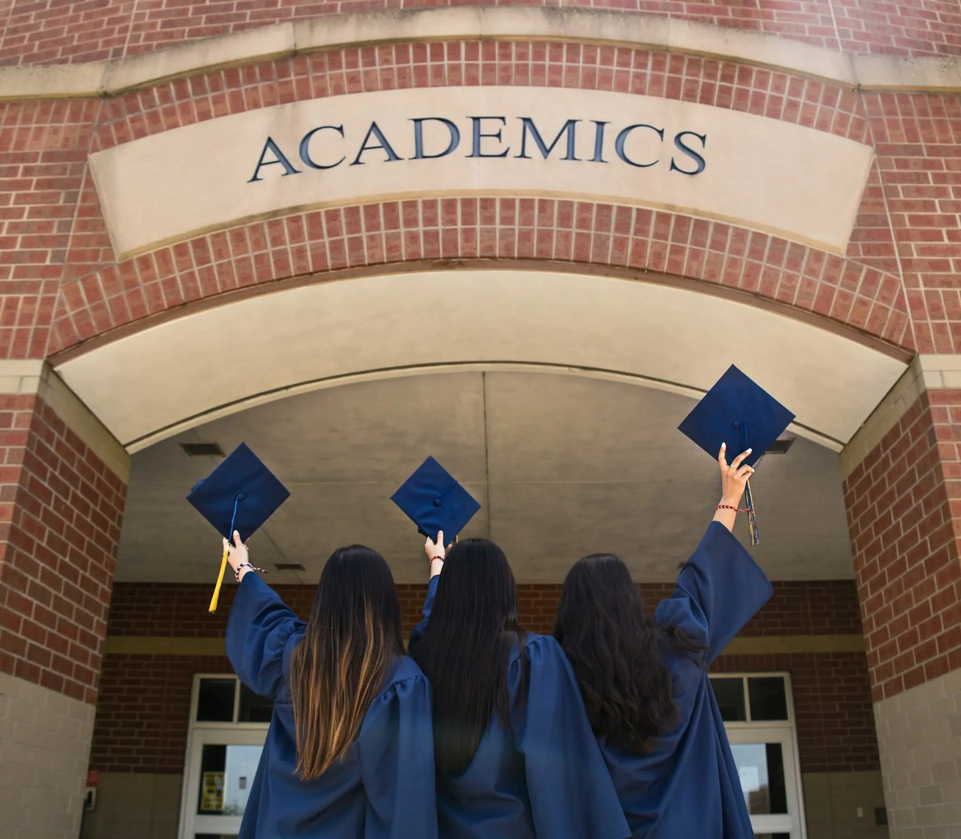 Graduates celebrating at commencement